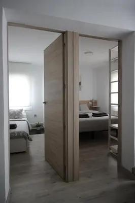 Cama o camas de una habitación en Apartamento los Pirineos Sabi
