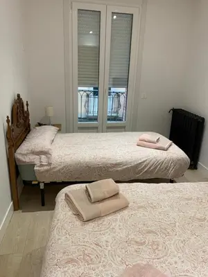 Cama o camas de una habitación en Casa Mery Pamplona