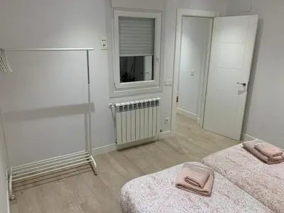 Cama o camas de una habitación en Casa Mery Pamplona