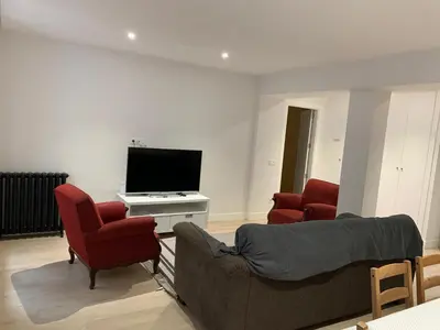 Una televisión o centro de entretenimiento en Casa Mery Pamplona