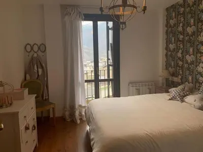 Cama o camas de una habitación en Casa Sesué ideal para familias