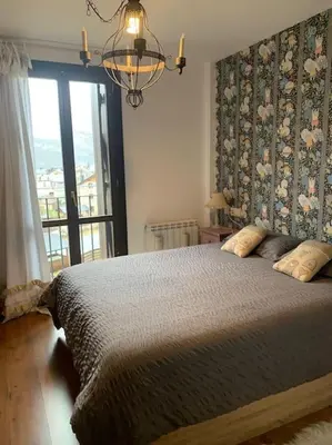 Cama o camas de una habitación en Casa Sesué ideal para familias
