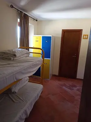 Cama o camas de una habitación en Albergue de Sos del Rey Católico