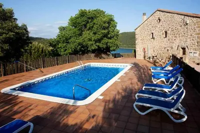 Piscina en o cerca de Masia Mas d'en Bosch Casa Rural Baronia de Rialb