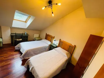 Cama o camas de una habitación en APARTAMENTOS RioMonte 5 - DeLuxe con Jacuzzi