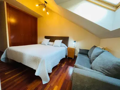 Cama o camas de una habitación en APARTAMENTOS RioMonte 5 - DeLuxe con Jacuzzi