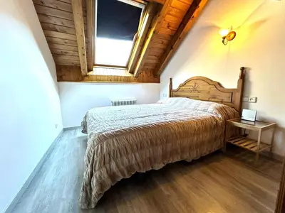 Cama o camas de una habitación en Dúplex lluminós a Esterri d'Àneu by RURAL D'ÀNEU