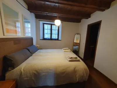 Cama o camas de una habitación en Acogedor apartamento de montaña con jardín y piscina - VU-HUESCA-23-182