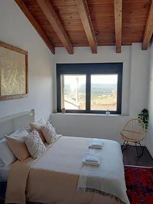 Cama o camas de una habitación en CASA RURAL ALEGRE