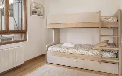 Cama o camas de una habitación en Apartamento Elurra Formigal