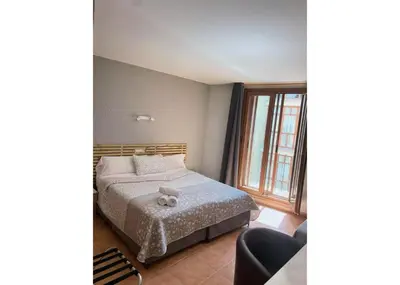 Cama o camas de una habitación en Hotel Acebo Plaza Mayor