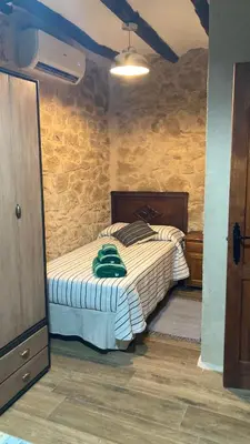 Cama o camas de una habitación en La gallina