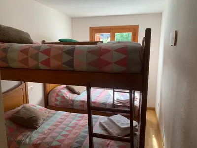 Cama o camas de una habitación en La Granja Benasque
