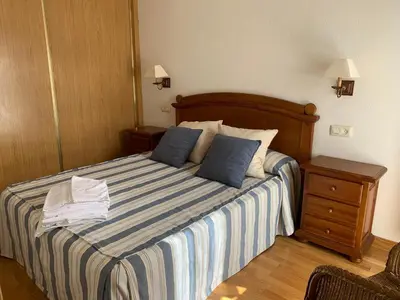 Cama o camas de una habitación en La Granja Benasque