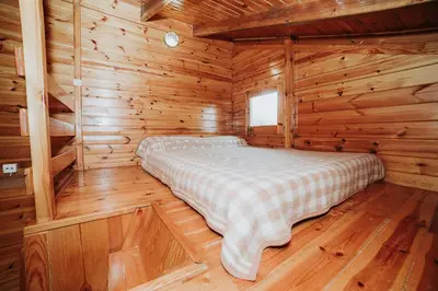 Cama o camas de una habitación en Vall d'Àger Resort & Camping