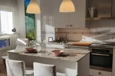 Una cocina o zona de cocina en Rincón de Tasio by Clabao