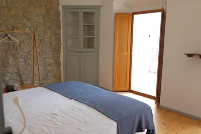 Cama o camas de una habitación en Les Cases del Moliner