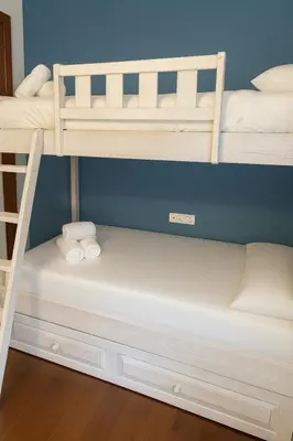 Cama o camas de una habitación en Vall Fosca - Apartamento con espectaculares vistas y jardín privado