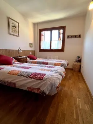 Cama o camas de una habitación en Ático dúplex Casa Ximet