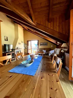 Zona de estar de Ático dúplex Casa Ximet