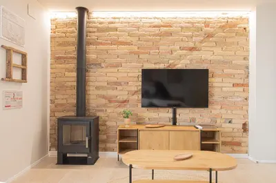 Una televisión o centro de entretenimiento en Casa Garrell
