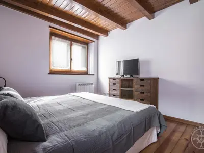 Cama o camas de una habitación en CASA REINA de Alma de Nieve