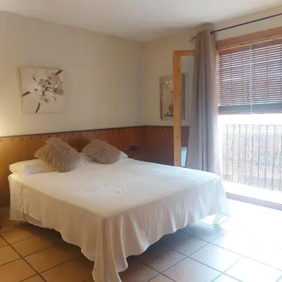 Cama o camas de una habitación en Hostal Tastavins