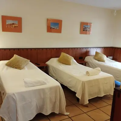 Cama o camas de una habitación en Hostal Tastavins