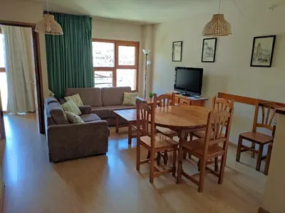 Una televisión o centro de entretenimiento en Apartamento de la Marmota Cerler