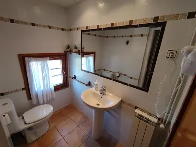 Un baño de Apartamento de la Marmota Cerler