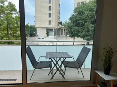 Un balcón o terraza de Apartamento MEDIODIA - Parking incluido, céntrico y tranquilo