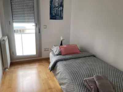 Cama o camas de una habitación en Apartamento MEDIODIA - Parking incluido, céntrico y tranquilo