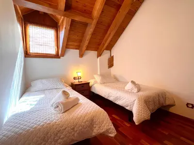 Cama o camas de una habitación en Apartament La Noguera - L'Amfitriona