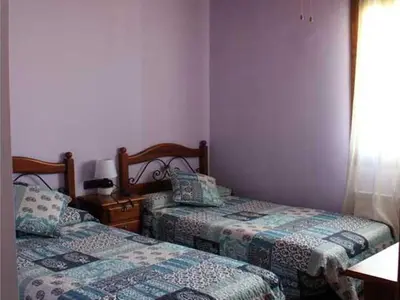 Cama o camas de una habitación en HOSTAL LA SAVINA