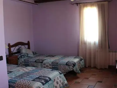 Cama o camas de una habitación en HOSTAL LA SAVINA