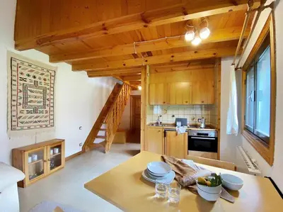 Una cocina o zona de cocina en Dúplex abuhardillado con parking