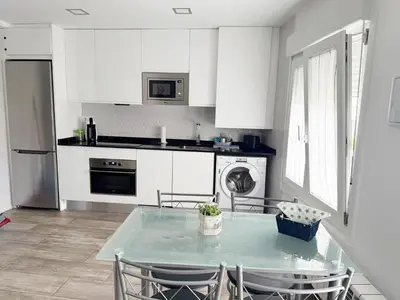 Una cocina o zona de cocina en Apartamento del Puente